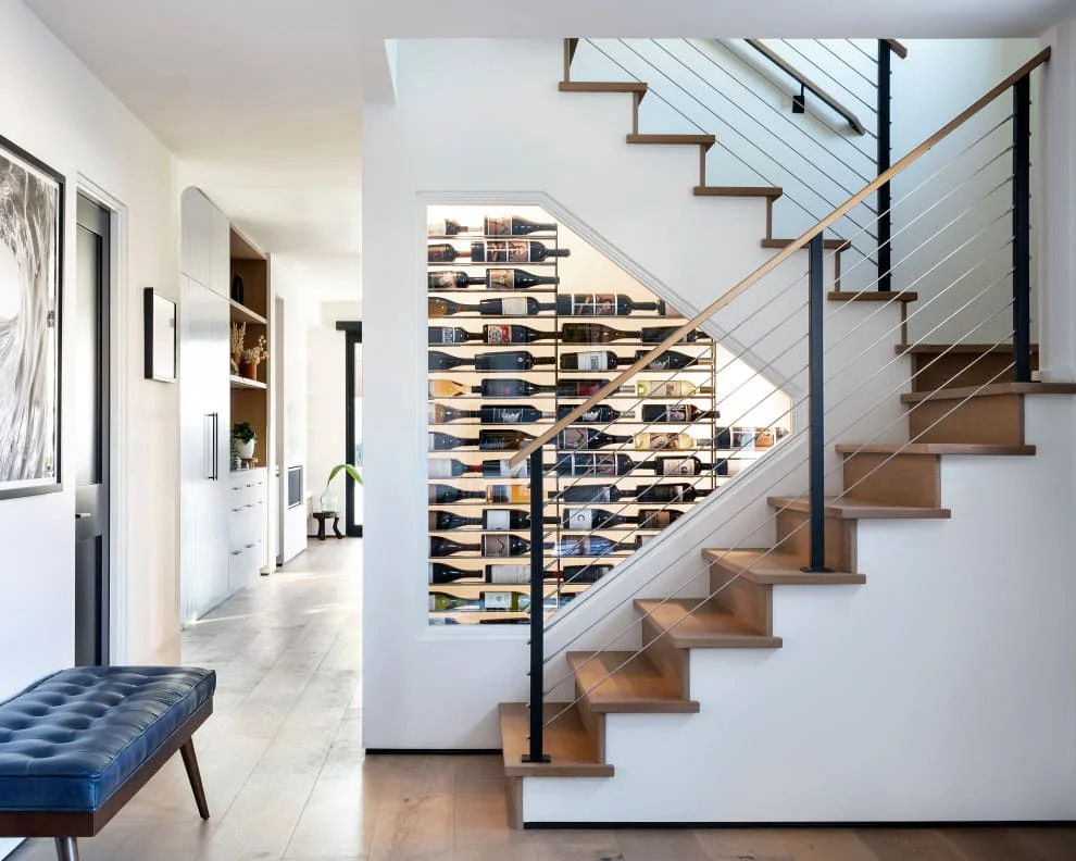 wine cellar under staircase